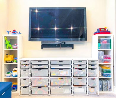 Bins with kids toys and television