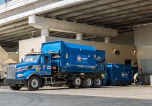 Truck using a compactor