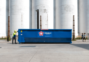 A roll-off dumpster