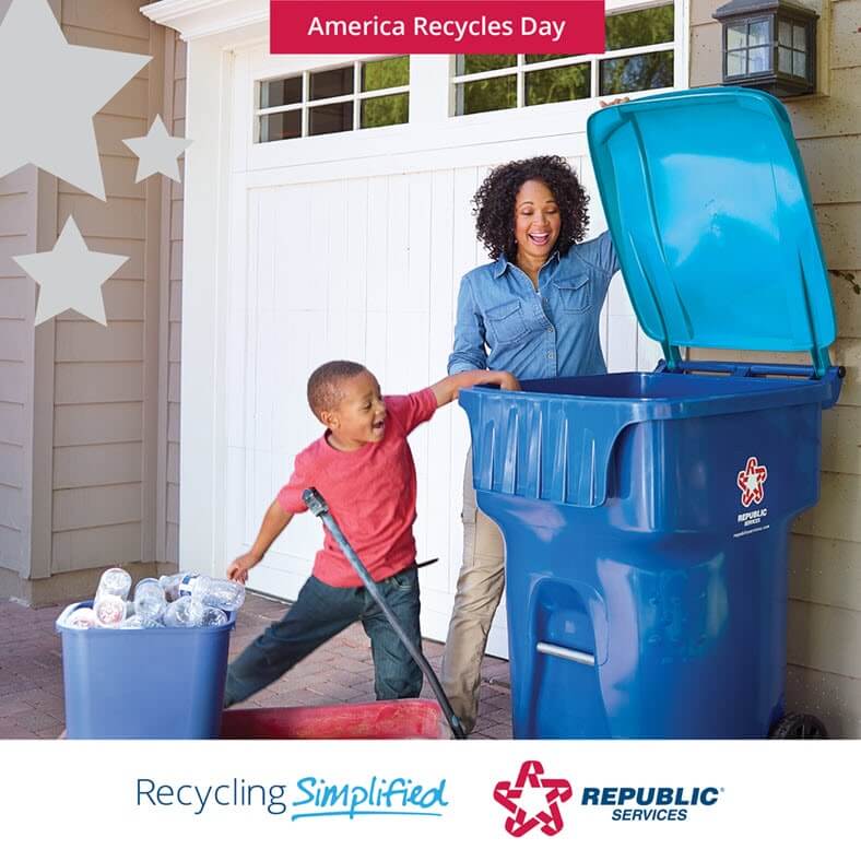 woman and child throwing recycling into Republic Services' recycling bin