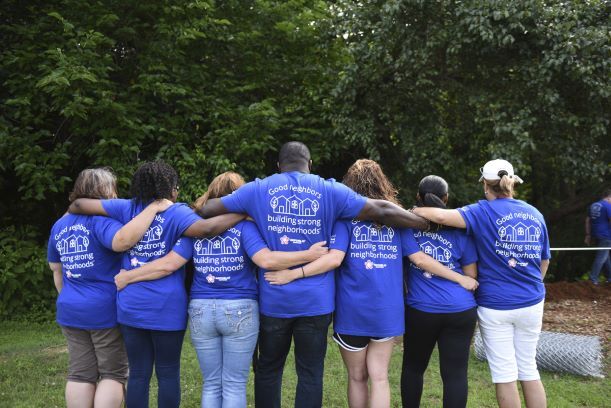 volunteers hugging