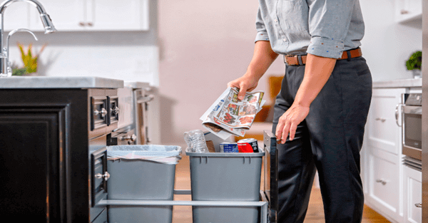 man recycling house hold items