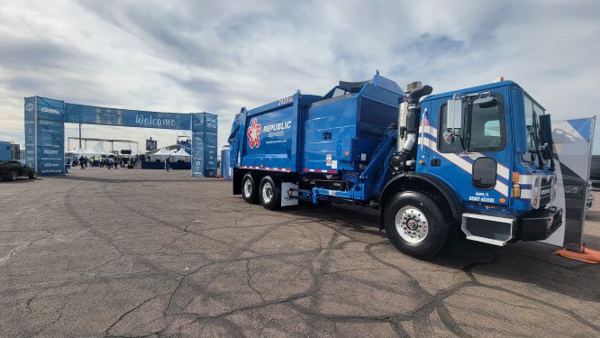 Republic Services truck in front of welcome banner