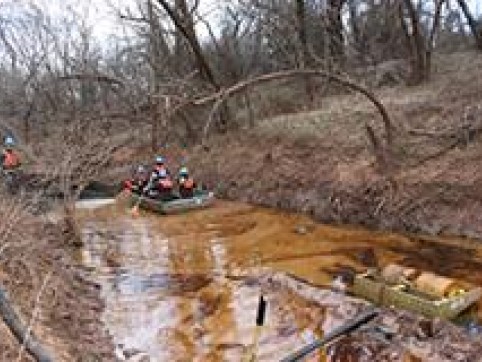 boat floating down a river