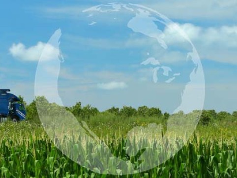 trash truck in the field of green