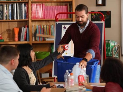 teacher teaching about recycling 
