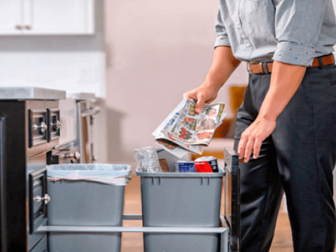 man recycling house hold items