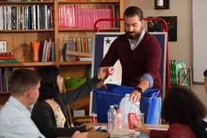 teacher teaching about recycling 