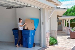 woman recycling cardboard boxes