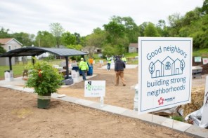 volunteers with national neighborhood promise community garden