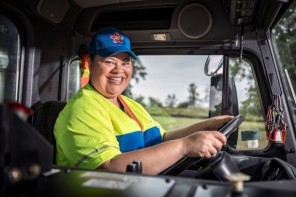 female garbage truck driver