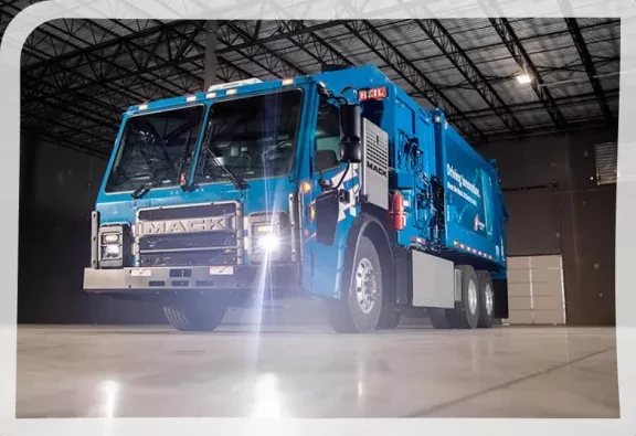 Garbage truck in a warehouse