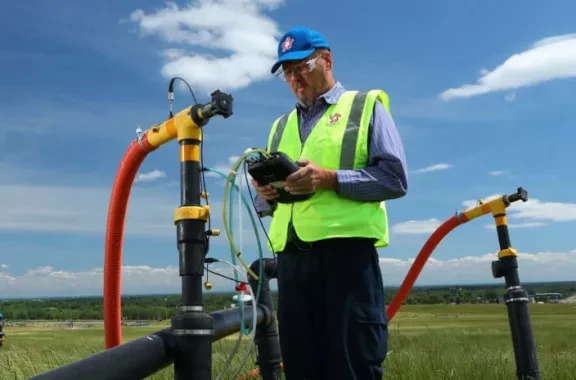 employee inspecting equipment